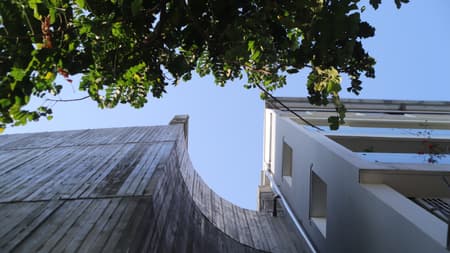 Vertical Tube House - Kam and Ly House