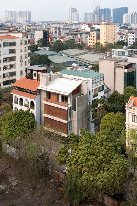 Vertical Tube House - Kam and Ly House